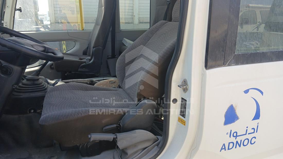2020 Toyota Coaster — Front Left Driver Seat View — Photo 12