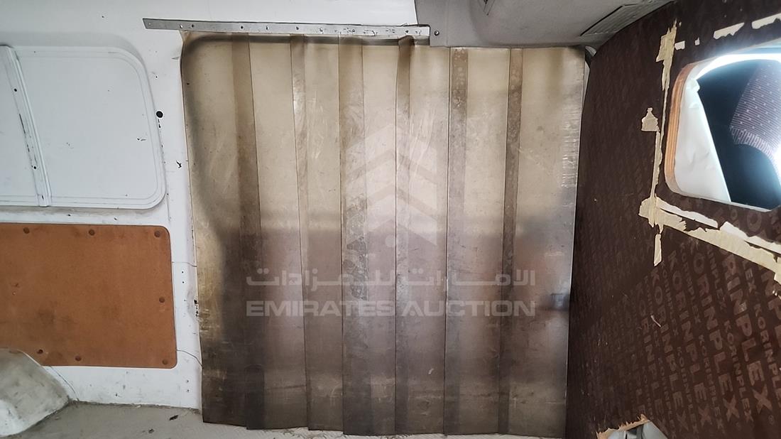 نيسان أورفان 2012 — الباب الخلفي الأيسر — صورة 13