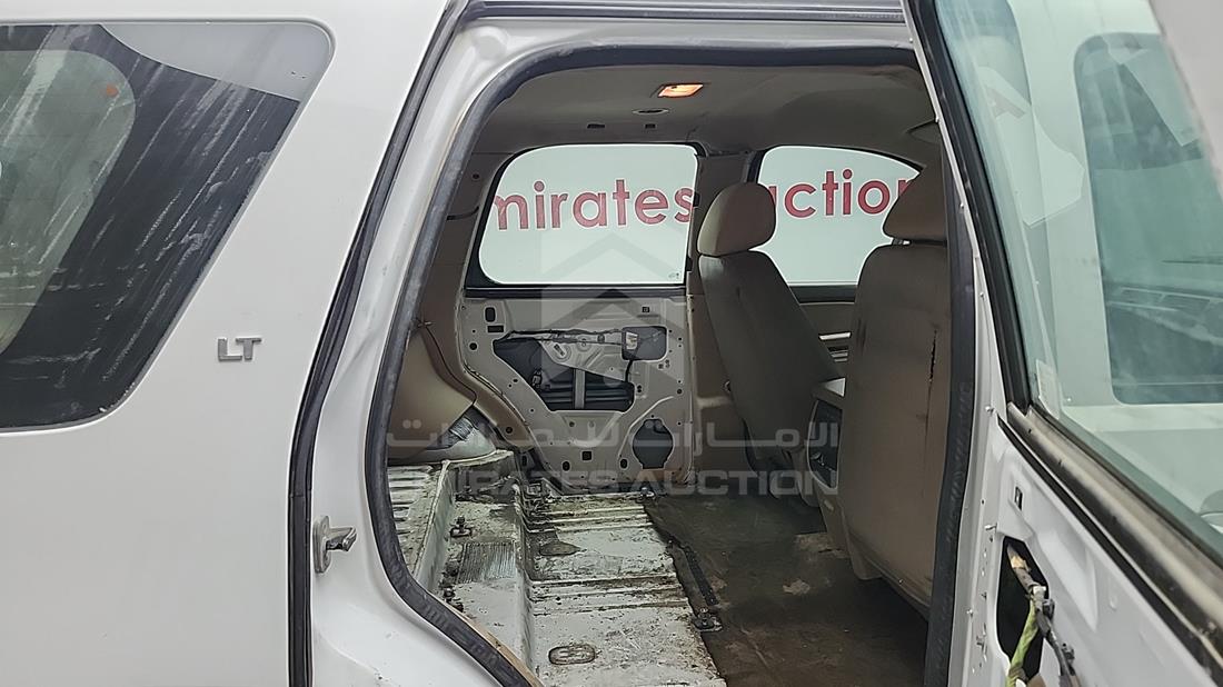 شيفروليه تاهو 2013 — زاوية الراكب الخلفي اليمنى — صورة 23