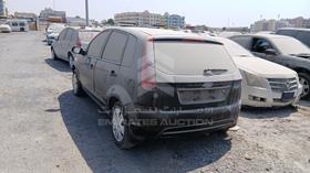 2012 Ford Figo — Rear Left Angle — Photo 6 — Thumbnail