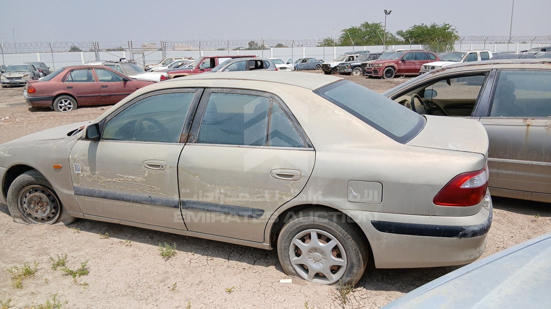 2001 Mazda 626 — Rear Left Angle — Photo 6