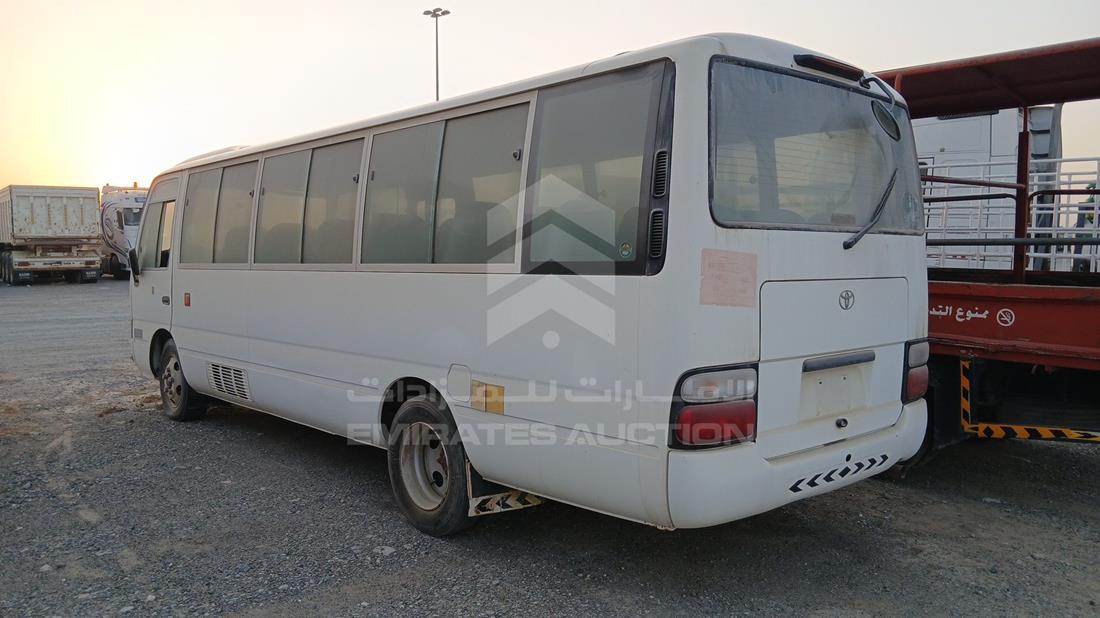 2014 Toyota Coaster — Rear Left Angle — Photo 6
