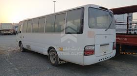 2014 Toyota Coaster — Rear Left Angle — Photo 6 — Thumbnail