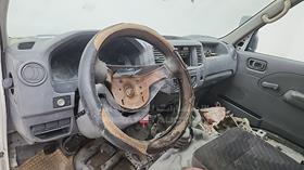 2005 Nissan Urvan — Front Left Driver Dashboard View — Photo 6 — Thumbnail