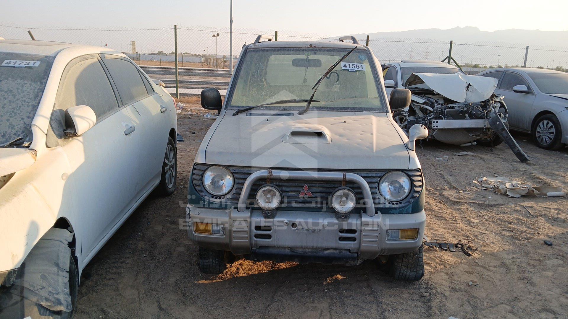1995 MITSUBISHI PAJERO MINI VIN: H56A5219694
