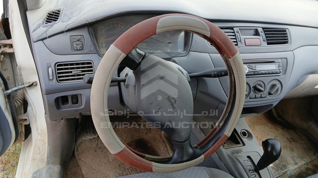 2002 Mitsubishi Lancer — Steering & Mounted Controls — Photo 13