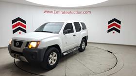2012 Nissan Xterra — Front Left Angle — Photo 6 — Thumbnail