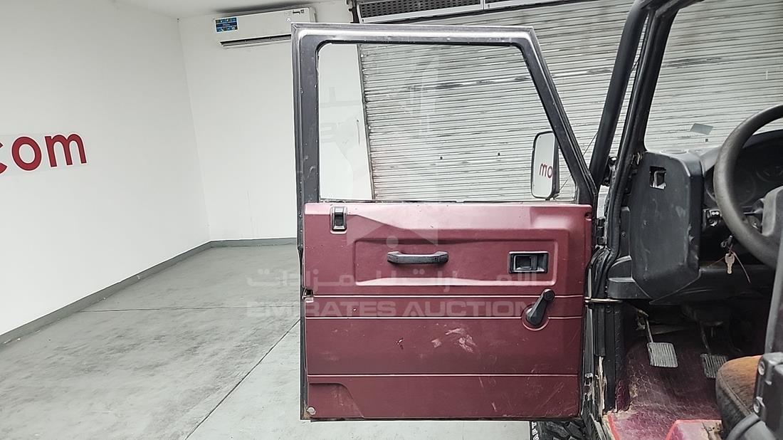2011 Land Rover Defender — Front Left Door — Photo 11