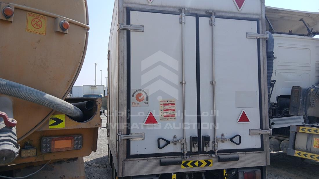 2014 Isuzu NMR — Rear Left Angle — Photo 6