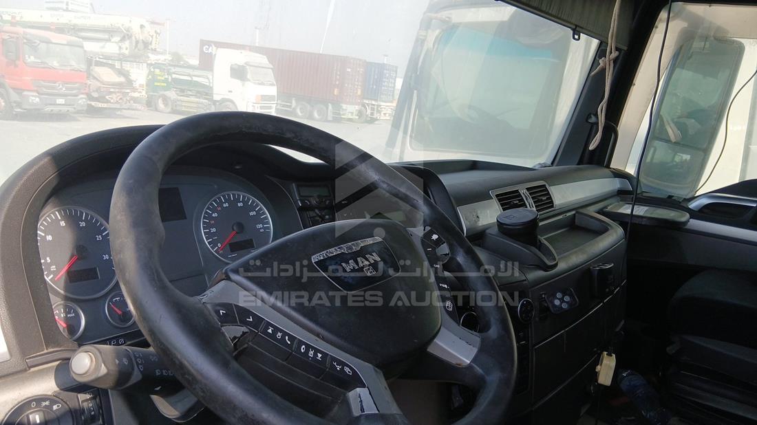 Man — Front Left Driver Dashboard View — Photo 11