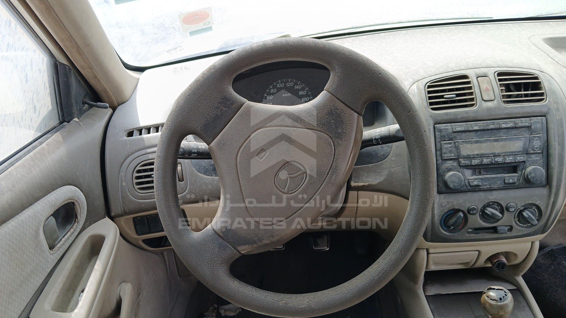 2004 MAZDA 323 VIN: JM7BJ123841225775