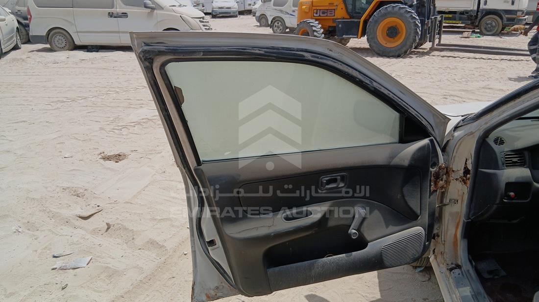 2000 Nissan Sunny — Front Left Door — Photo 9