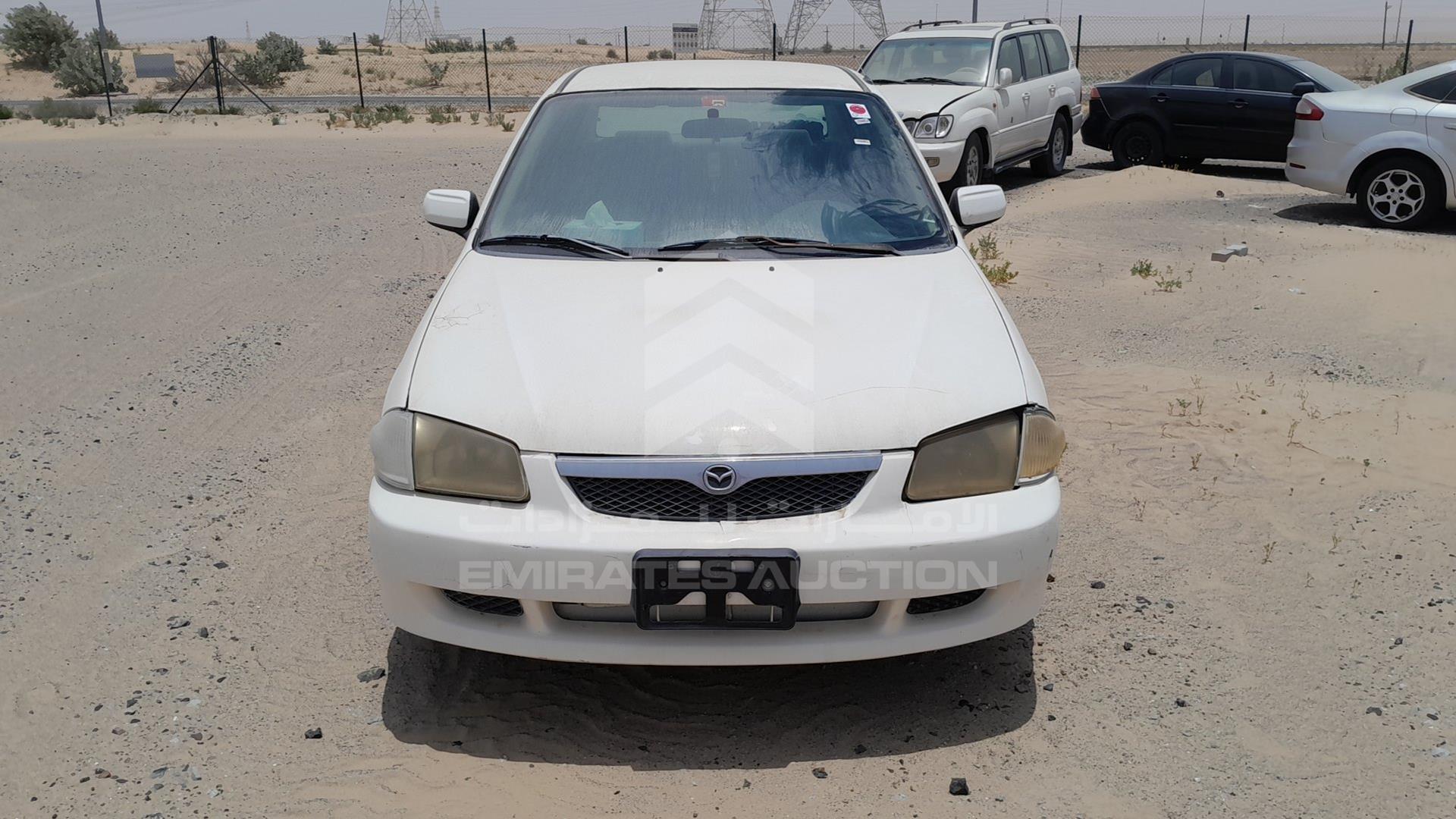 1999 MAZDA 323 VIN: JM7BJ12M9X0106555