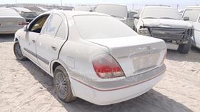 2013 Nissan Sunny — Rear Left Angle — Photo 6 — Thumbnail
