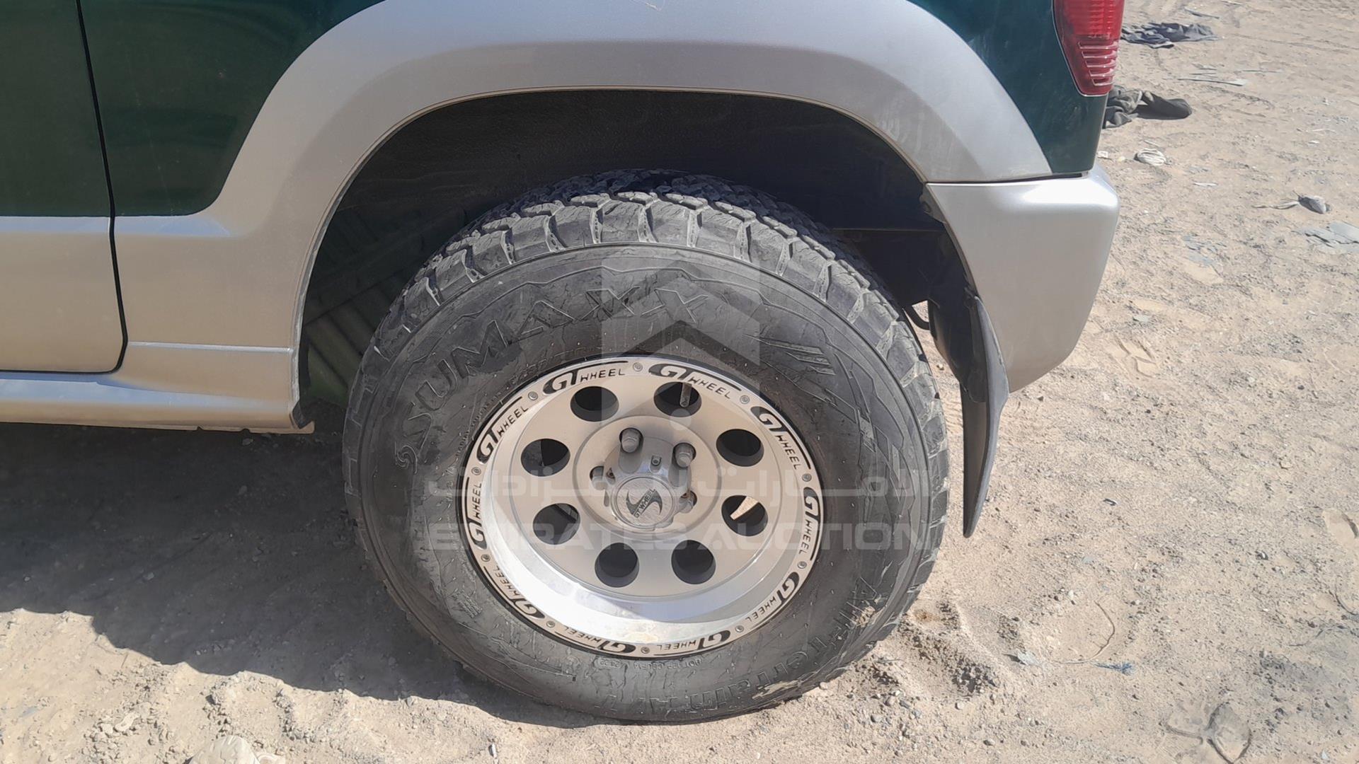 1998 MITSUBISHI PAJERO MINI VIN: H58A0014220