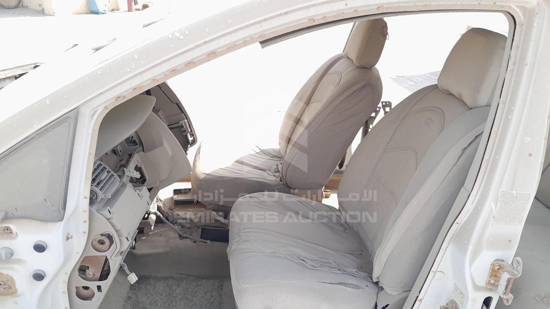 نيسان تيدا 2009 — زاوية السائق الأمامية اليسرى — صورة 12