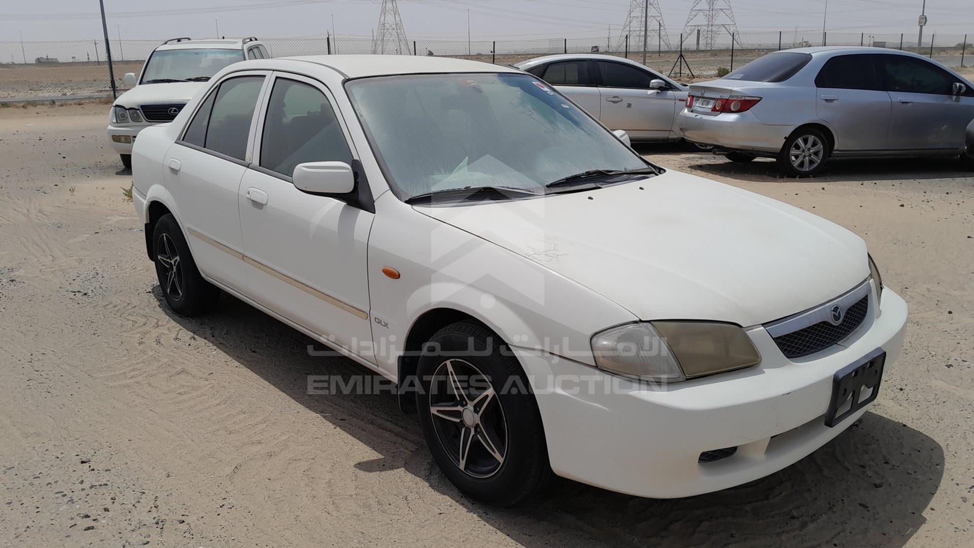 1999 MAZDA 323 VIN: JM7BJ12M9X0106555