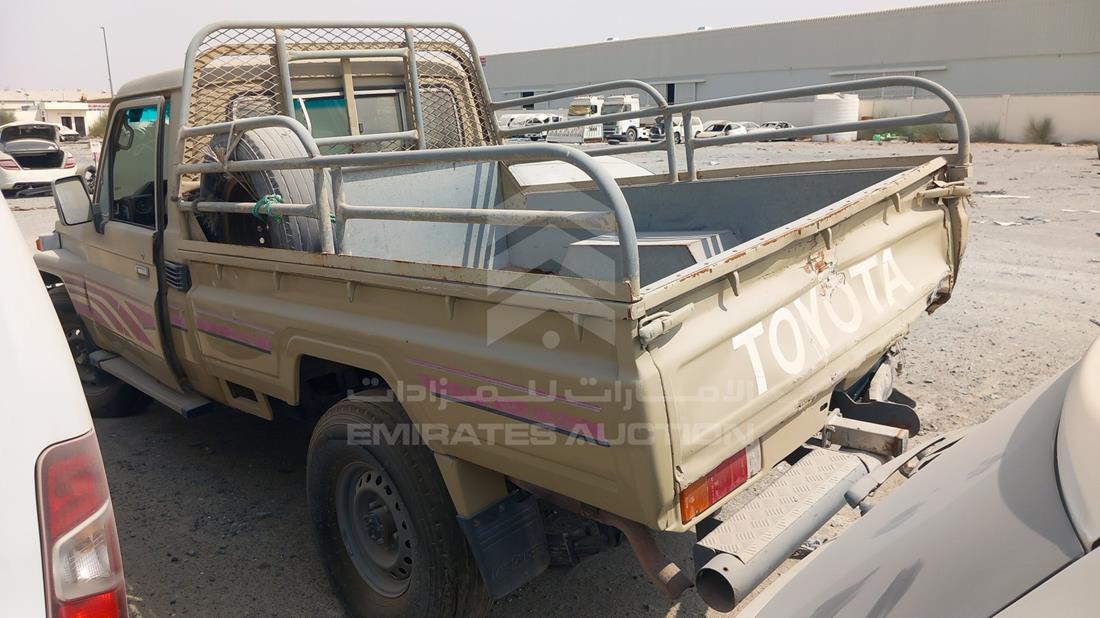 2002 Toyota Land Cruiser Pickup — Rear Left Angle — Photo 6