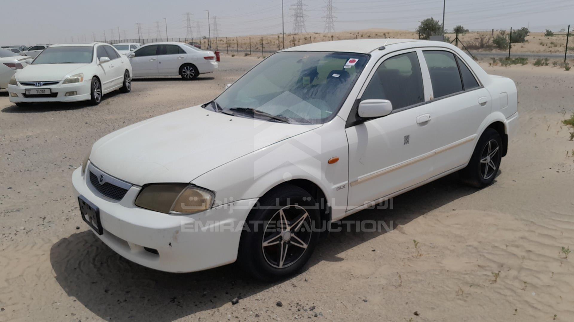 1999 MAZDA 323 VIN: JM7BJ12M9X0106555