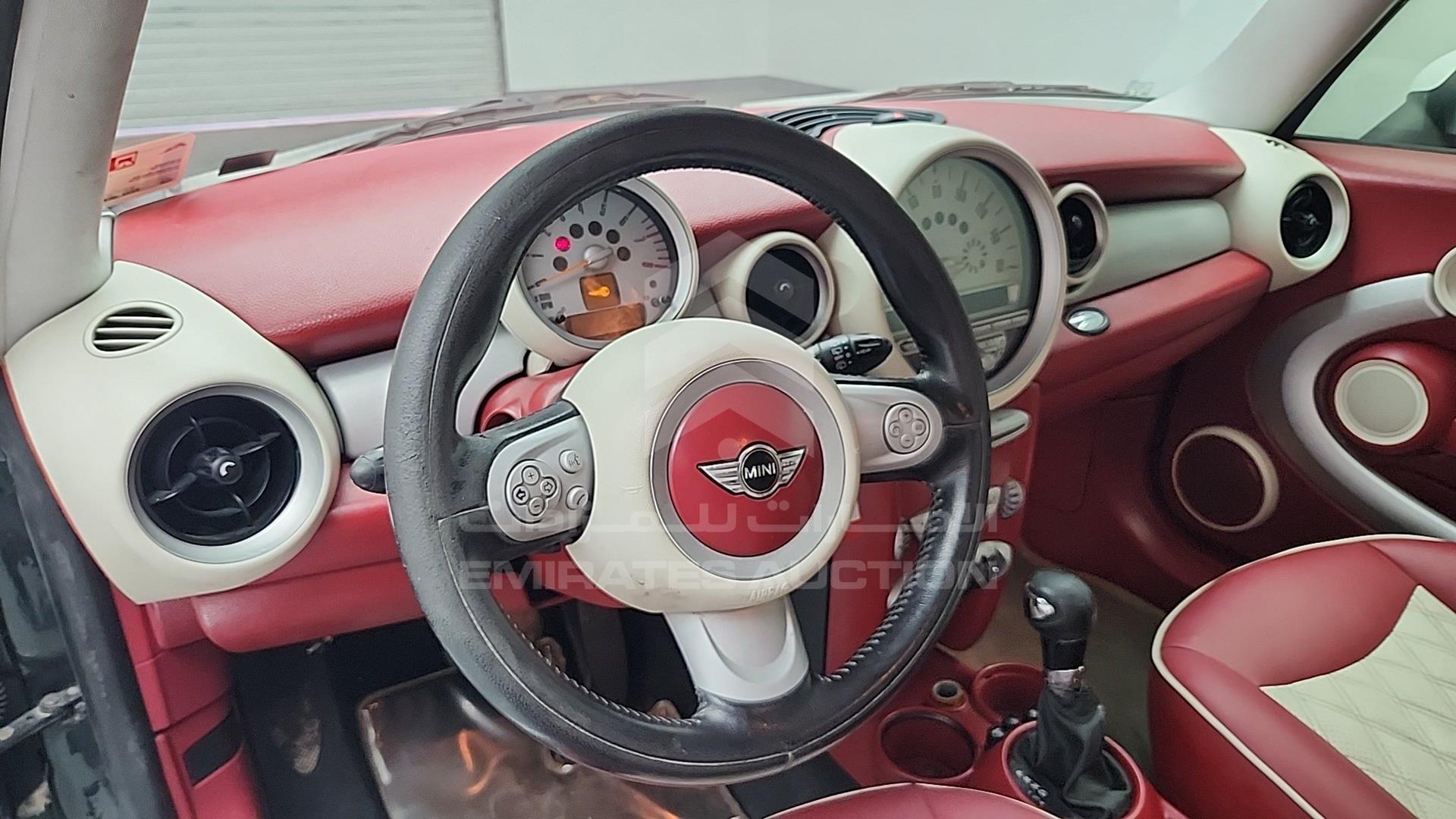 2010 MINI COOPER VIN: WMWMF3C55ATZ25394