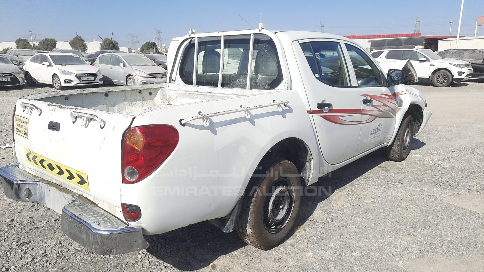 2010 MITSUBISHI L 200 VIN: MMBJNKA50AD031418
