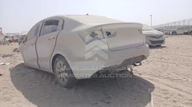 2013 Kia Rio — Rear Left Angle — Photo 6 — Thumbnail