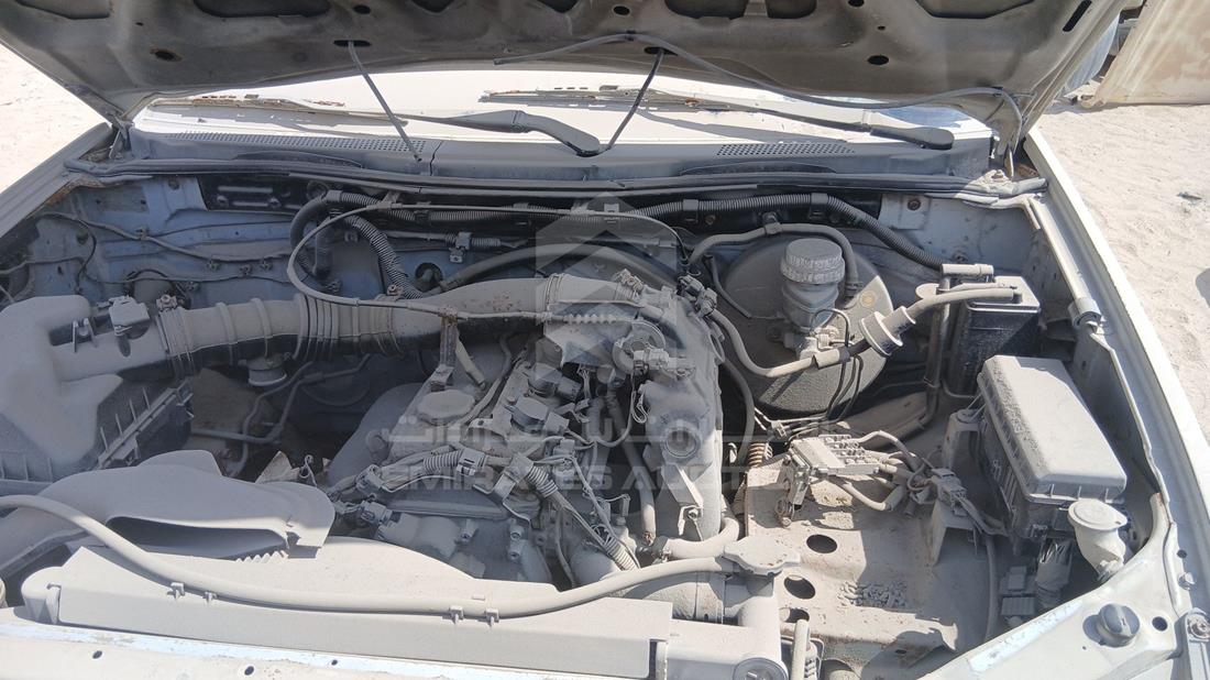 ميتسوبيشي L 200 2008 — خليج المحرك — صورة 26