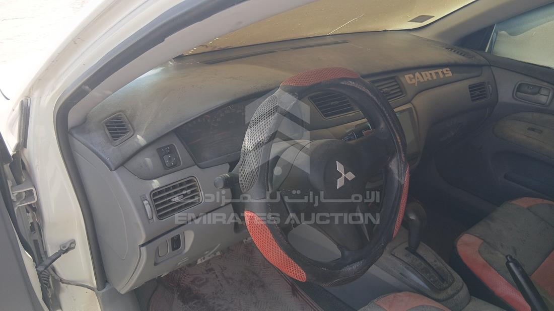 ميتسوبيشي لانسر 2009 — زاوية واجهة السائق الأمامية اليسرى — صورة 11