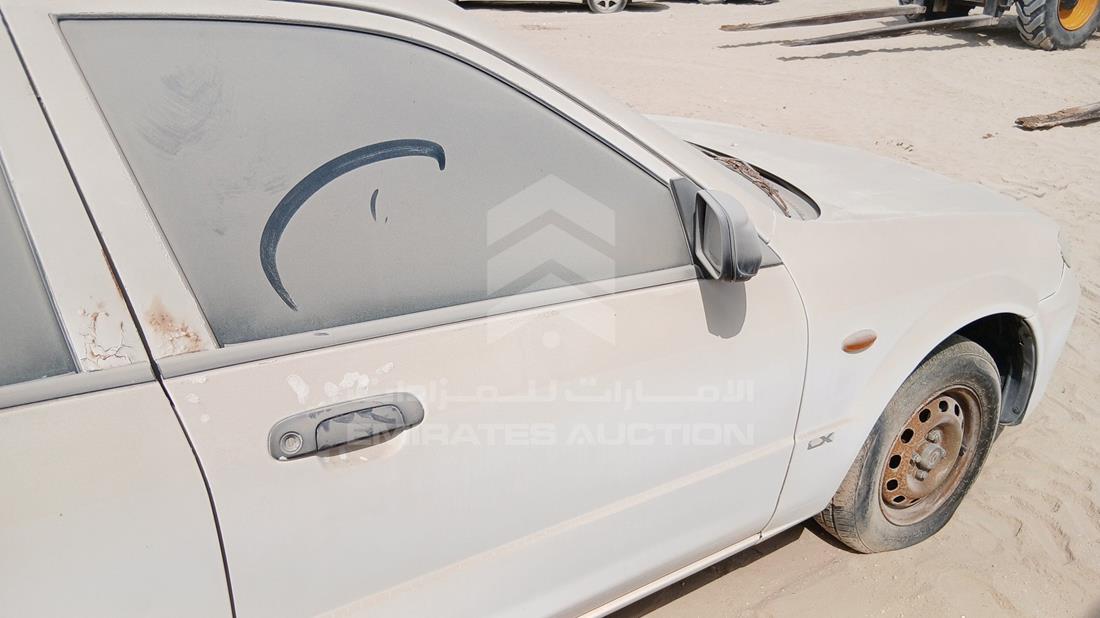 مازدا 323 2003 — الباب الأمامي الأيمن — صورة 21