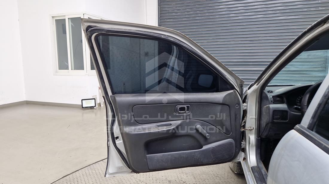 2000 Nissan Sunny — Front Left Door — Photo 10
