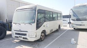 2020 Toyota Coaster — Front Left Angle — Photo 5 — Thumbnail