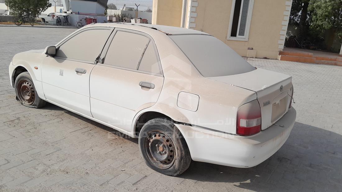2003 Mazda 323 — Rear Left Angle — Photo 6
