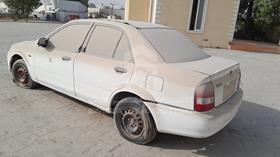 2003 Mazda 323 — Rear Left Angle — Photo 6 — Thumbnail