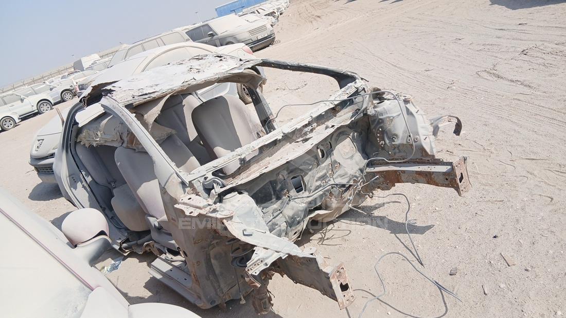 تويوتا ياريس 2006 — الزاوية الأمامية اليمنى — صورة 8