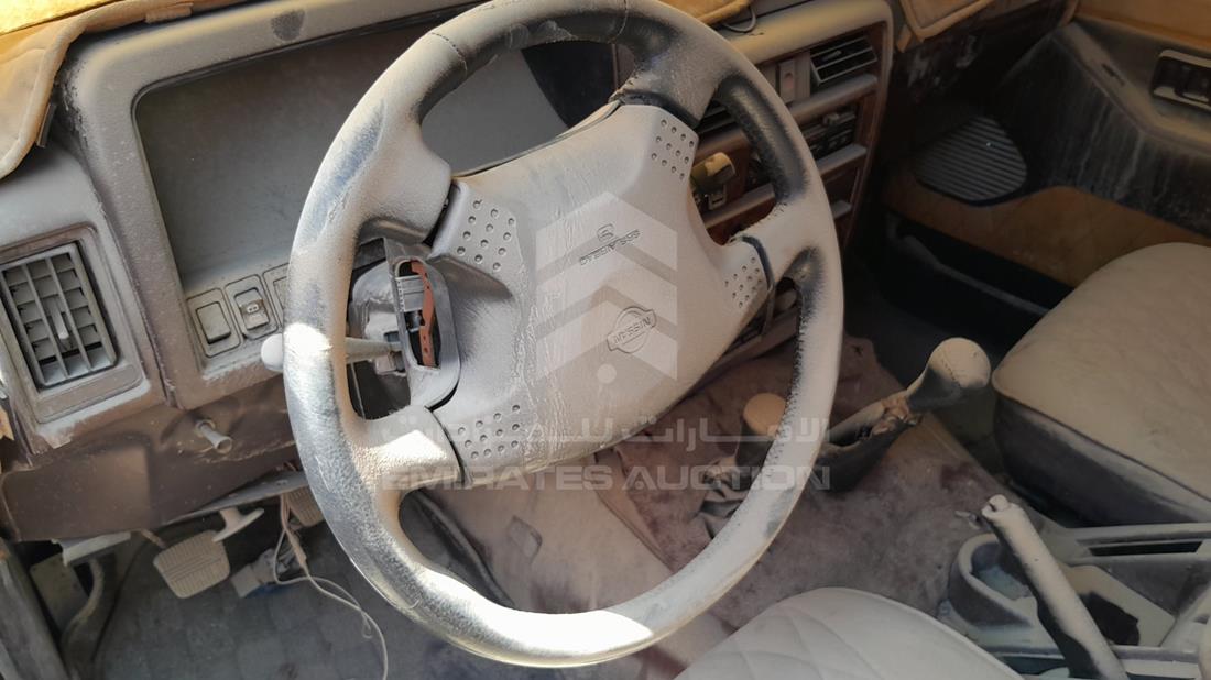 نيسان Abarth 695 1995 — التحكمات في عجلة القيادة — صورة 13