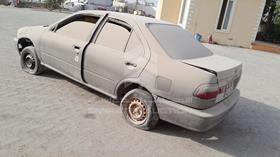 1999 Nissan Sunny — Rear Left Angle — Photo 6 — Thumbnail