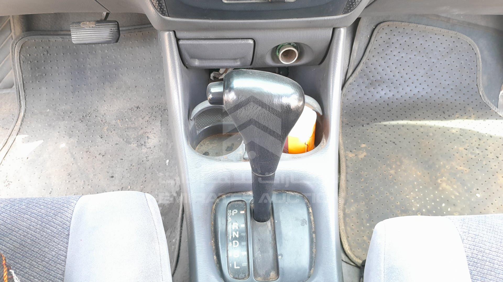 1999 MAZDA 323 VIN: JM7BJ12M9X0106555