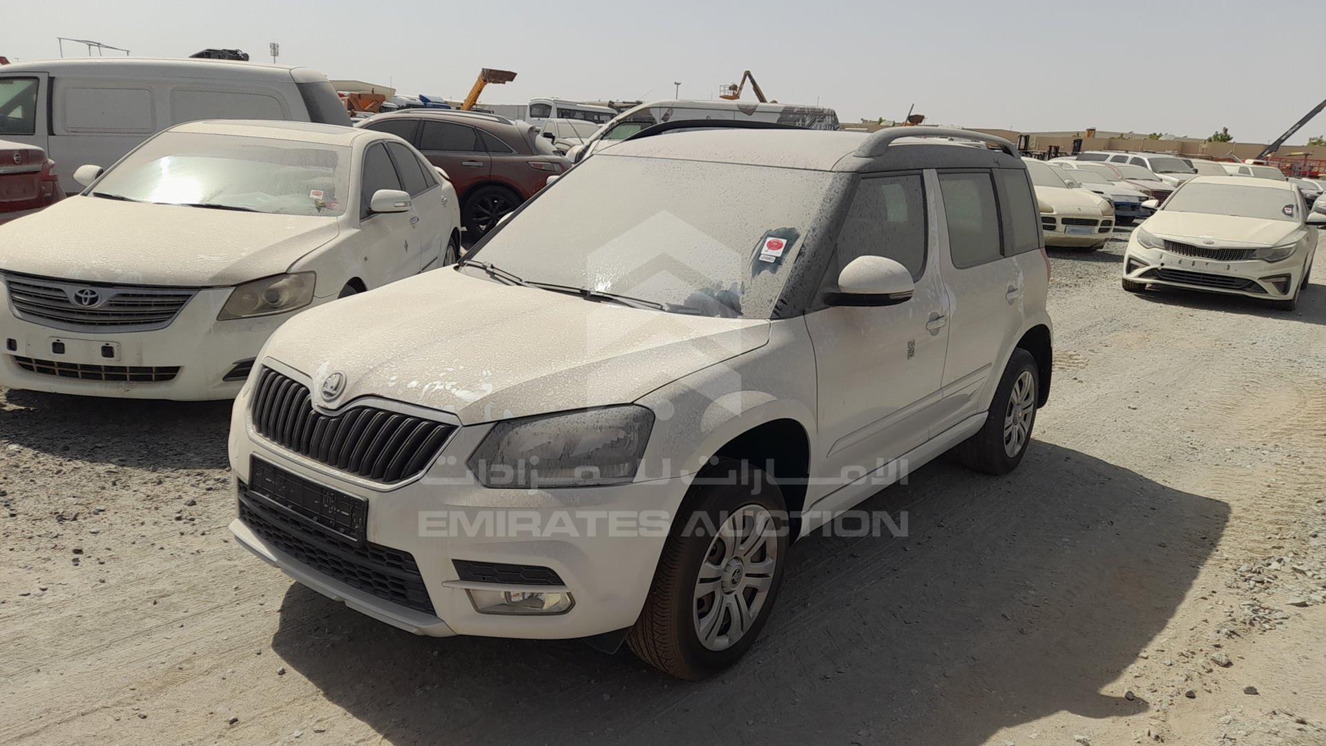 2015 SKODA YETI VIN: TMBJJ2ND0F6990002
