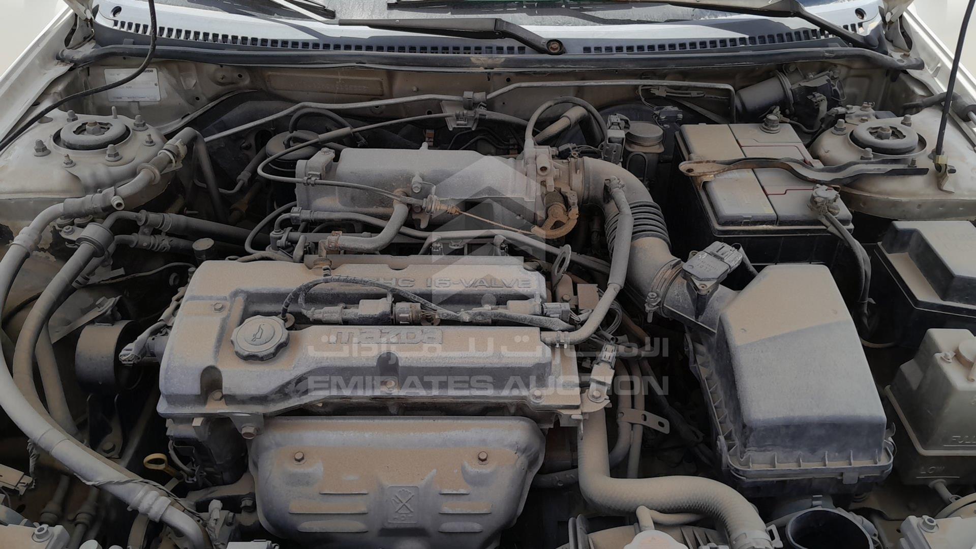 1999 MAZDA 323 VIN: JM7BJ12M9X0106555