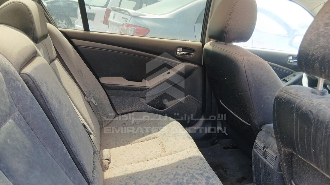 نيسان التيما 2010 — زاوية الراكب الخلفي اليمنى — صورة 19