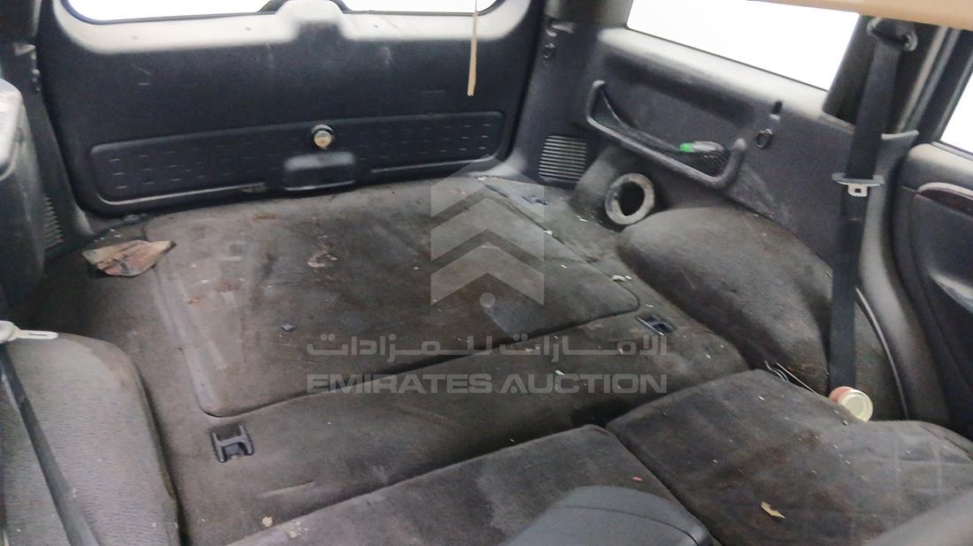 جيب جراند شيروكي 2001 — زاوية الراكب الخلفي اليمنى — صورة 25