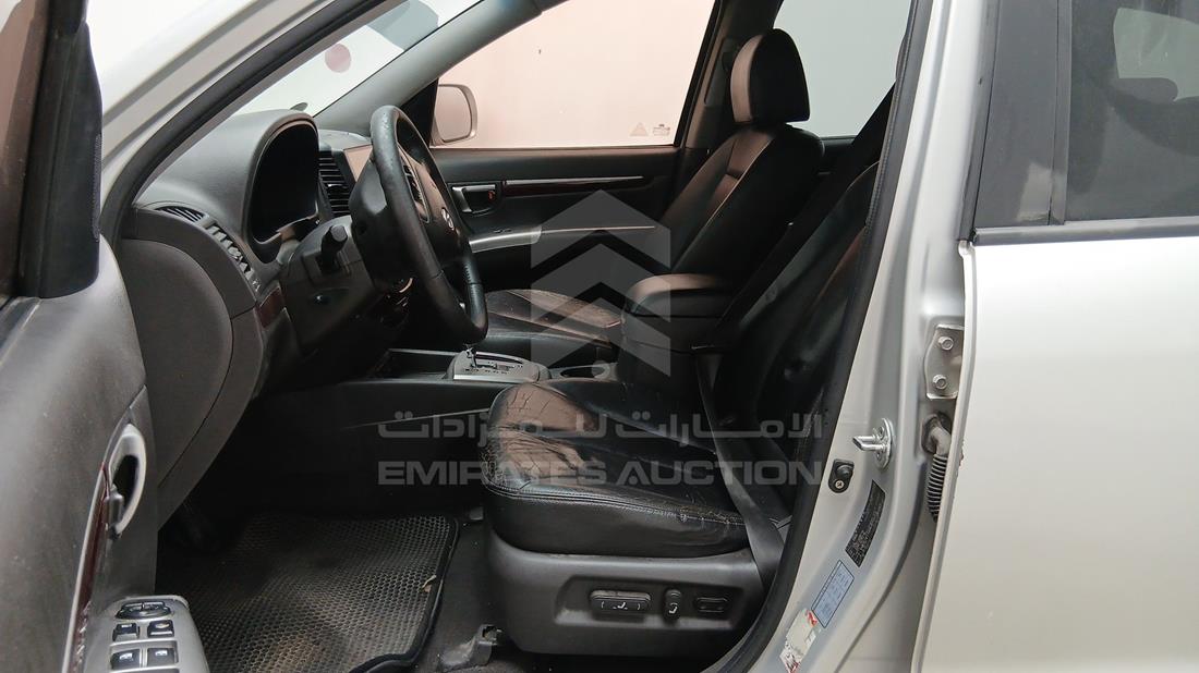 هيونداي سانتا في 2010 — زاوية السائق الأمامية اليسرى — صورة 13