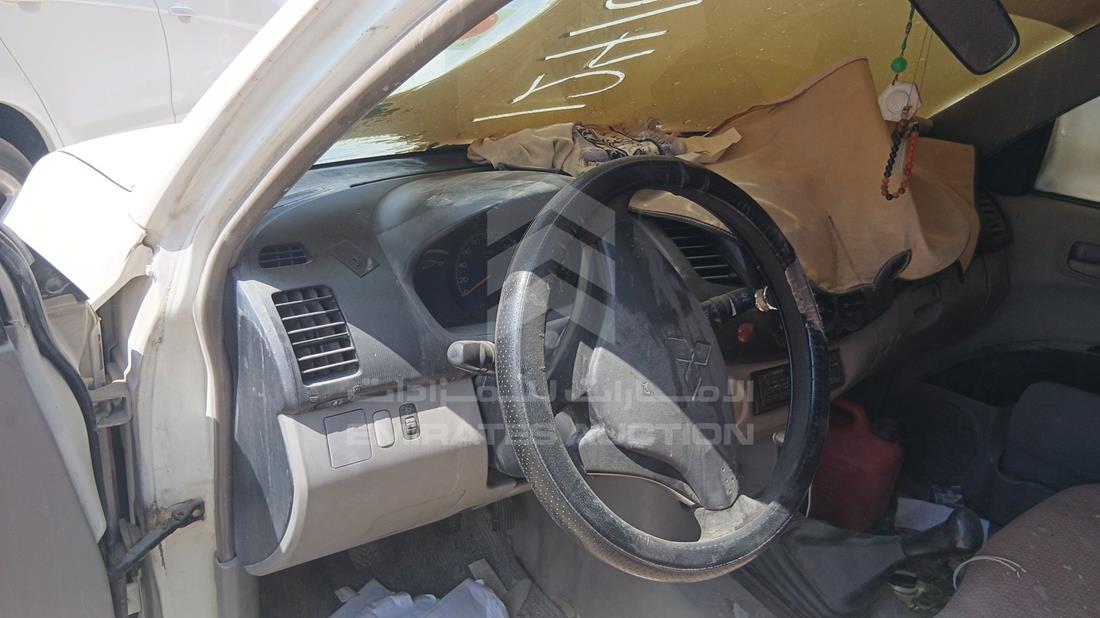 ميتسوبيشي L 200 2008 — زاوية واجهة السائق الأمامية اليسرى — صورة 11