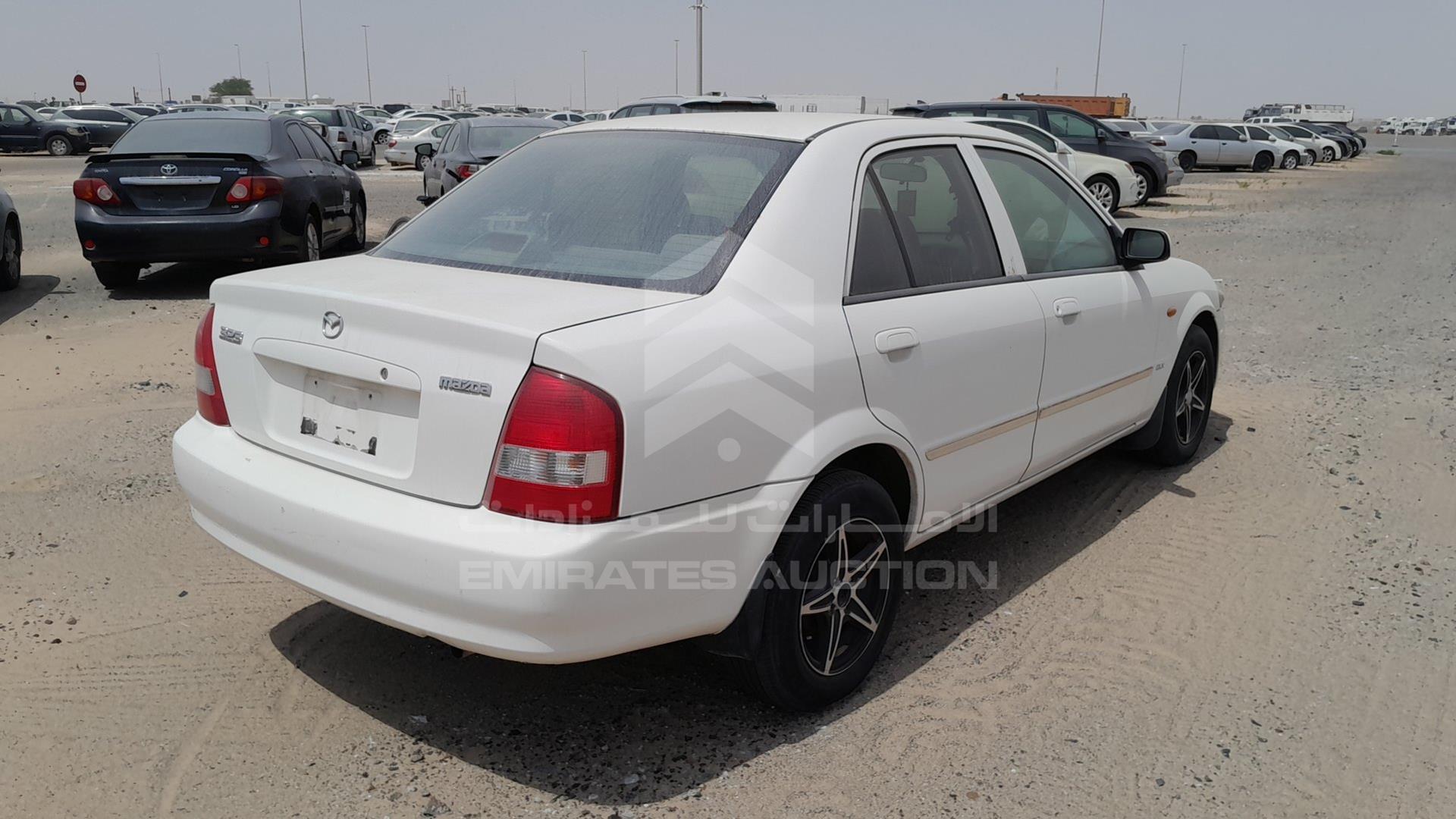 1999 MAZDA 323 VIN: JM7BJ12M9X0106555