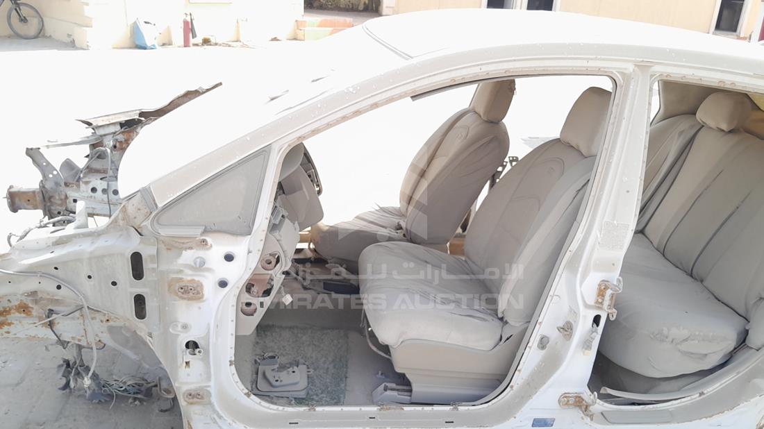نيسان تيدا 2009 — الباب الأمامي الأيسر — صورة 10