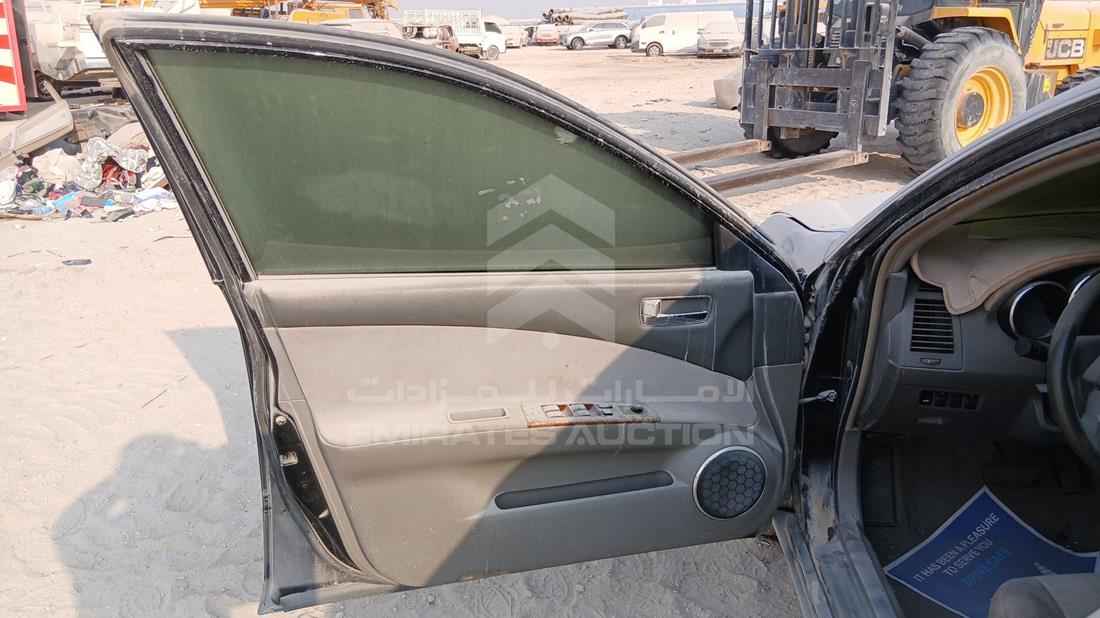 نيسان التيما 2006 — الباب الأمامي الأيسر — صورة 10