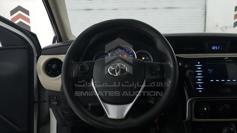 RKLBB9HE9J5206559 Auction: EmiratesAuction Lot: 404120 RKLBB9HE9J5206559 Toyota Corolla 2018 WHITE Photo 13