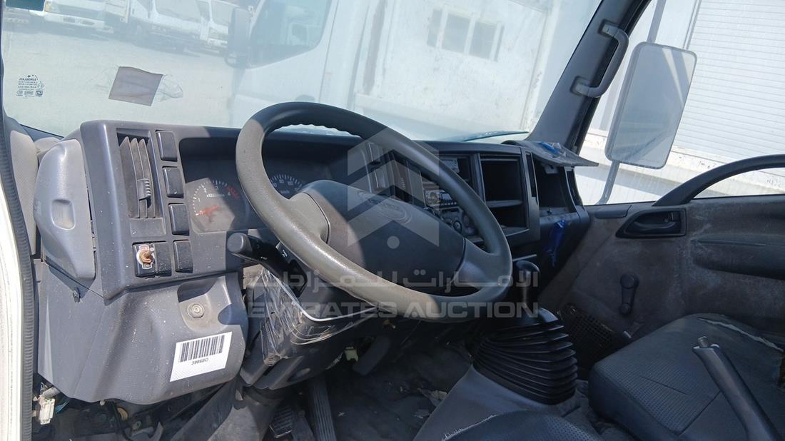 2014 Isuzu NMR — Front Left Driver Dashboard View — Photo 11