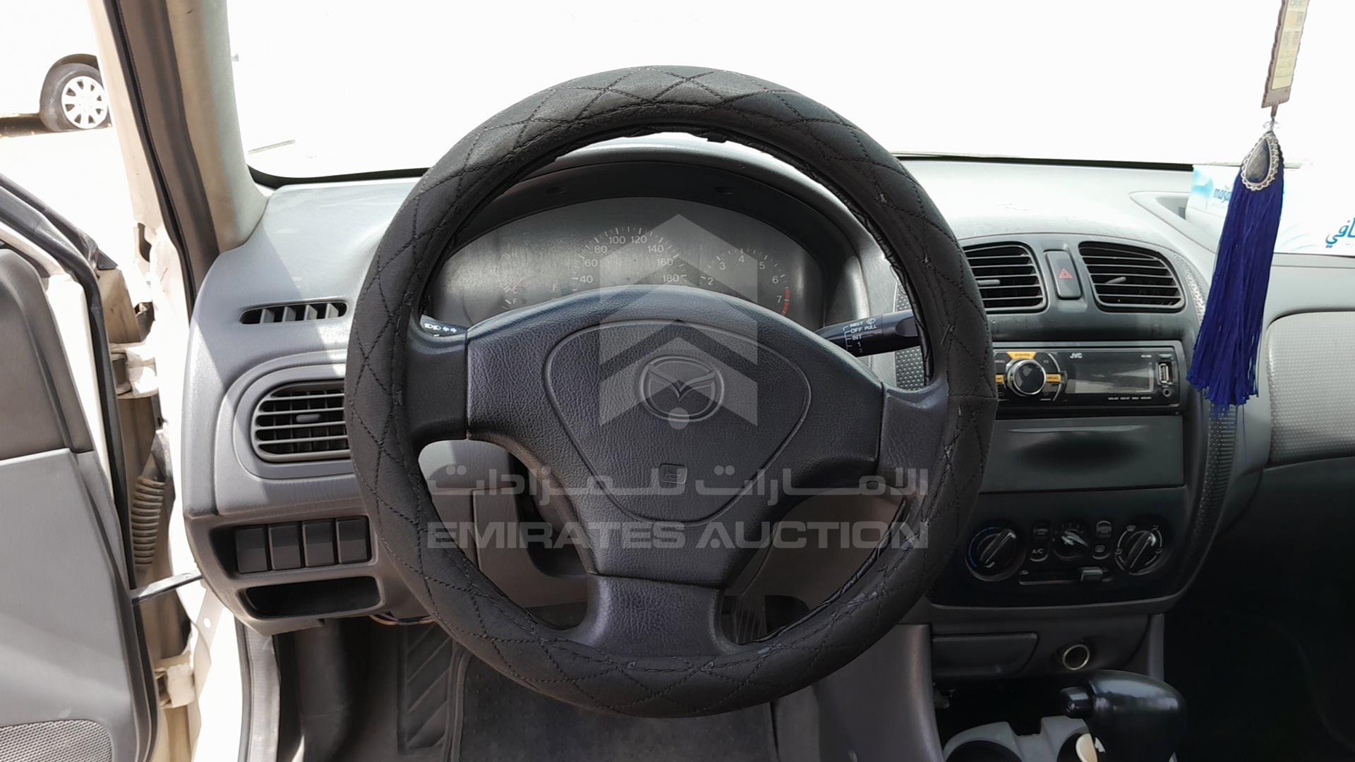 1999 MAZDA 323 VIN: JM7BJ12M9X0106555