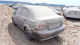 2011 Chevrolet Aveo — Rear Left Angle — Photo 6 — Thumbnail